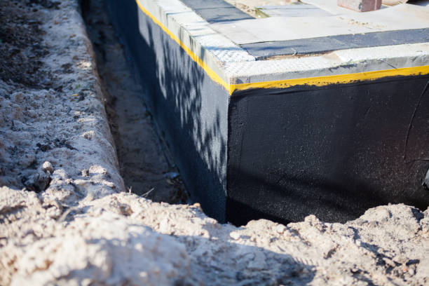 Professional Basement Waterproofing technician working in Stone Park, IL